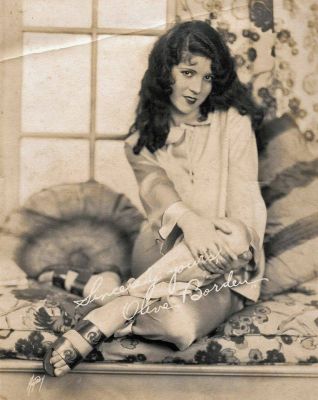 Click to view full size image
==============
Olive Borden
THIS PHOTO HAS BEEN DONATED TO THE NILES ESSANAY SILENT FILM MUSEUM.
The front side of this photo reads: "Sincerely yours, Olive Borden." Portrait made by Max Autrey, Hollywood, California. Photo donated by Elaine Swan.
Olive Borden
THIS PHOTO HAS BEEN DONATED TO THE NILES ESSANAY SILENT FILM MUSEUM.
The front side of this photo reads: "Sincerely yours, Olive Borden." Portrait made by Max Autrey, Hollywood, California. Photo donated by Elaine Swan.