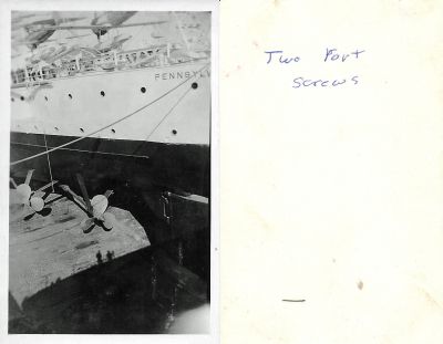 Click to view full size image
==============
USS Pennsylvania
This was Donated by Elaine Swan.
This Photo States: "Two port screws."
NOTE: The "screws" refer to the ship's propellers. The ship shown is the USS Pennsylvania (BB-38) in dry dock. Note the tiny human shadows about 2/3 of the way toward the bottom center of the photo.
USS Pennsylvania
This was Donated by Elaine Swan.
This Photo States: "Two port screws."
NOTE: The "screws" refer to the ship's propellers. The ship shown is the USS Pennsylvania (BB-38) in dry dock. Note the tiny human shadows about 2/3 of the way toward the bottom center of the photo.