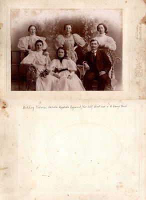 Estelle Maybelle Haywood (Far Left, Front Row) & W. Emery Noel

THIS HAS BEEN RETURNED TO FAMILY

This photo mounted on board states: "Estelle Maybelle Haywood (Far Left, Front Row) & W. Emery Noel"

The Photographer was in Wapakoneta, Ohio
