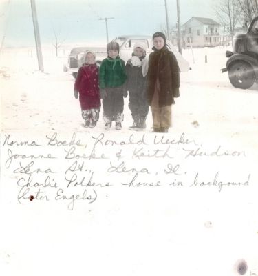 Norma Boeke, Ronald _ecker, Joanne Boeke & Keith Hudson

This Photo States: "Norma Boeke, Ronald _ecker, Joanne Boeke & Keith Hudson, Lena Str., Lena, Illinois. Charlie Polkers house in background (later Engels)"
