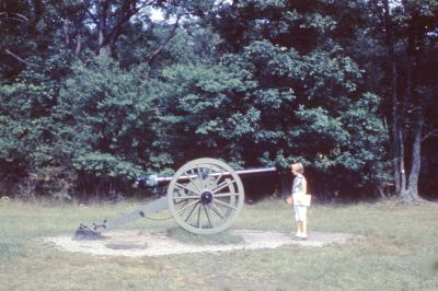 Dana Rinehart

THIS HAS BEEN RETURNED TO FAMILY

This 35MM Slide States: "Dana & cannon", Gettysburg, Pennsylvania, Summer 1961.
